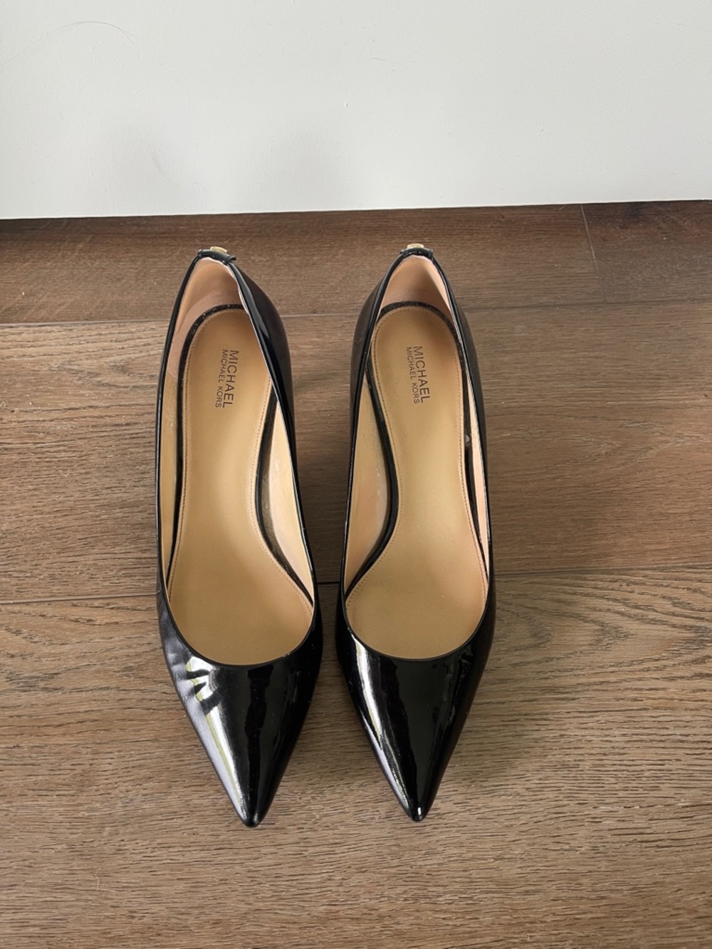 Michael Kors Black Patent Pointed-Toe
 Pumps. Approx. 2” heel. No smoking/pets.